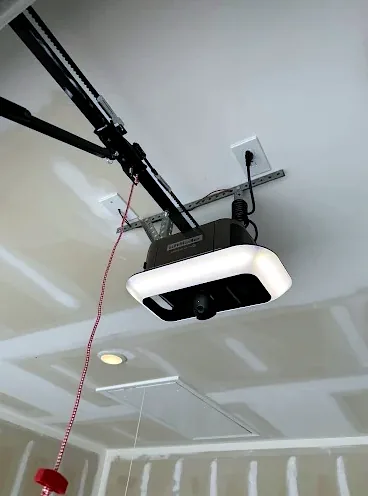 Smart garage door opener with integrated light